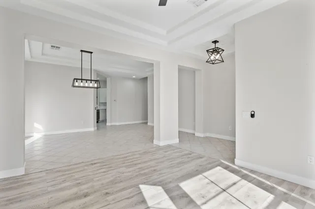 a view of a kitchen with a sink and a window