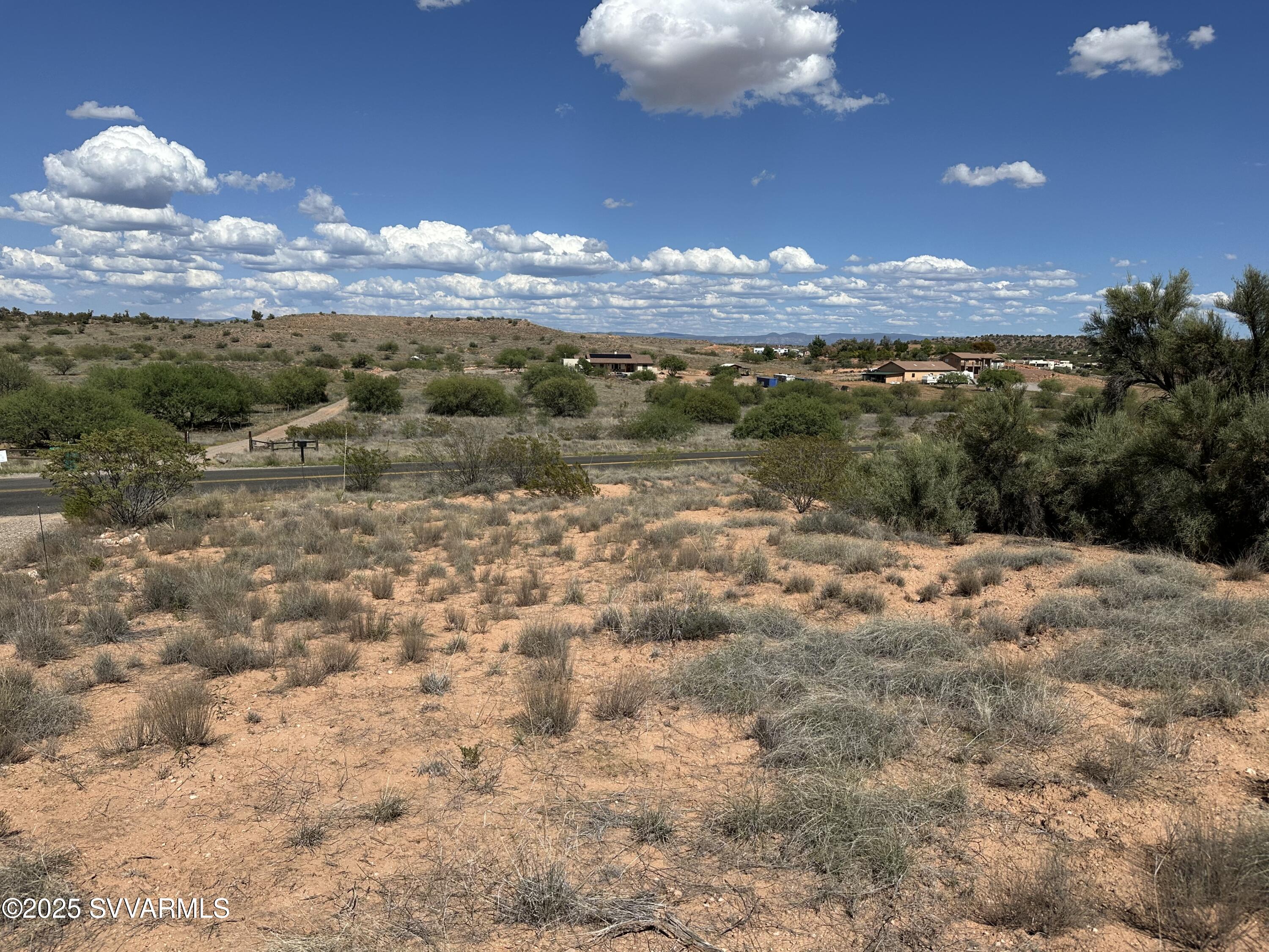 a view of a lake in middle of forest