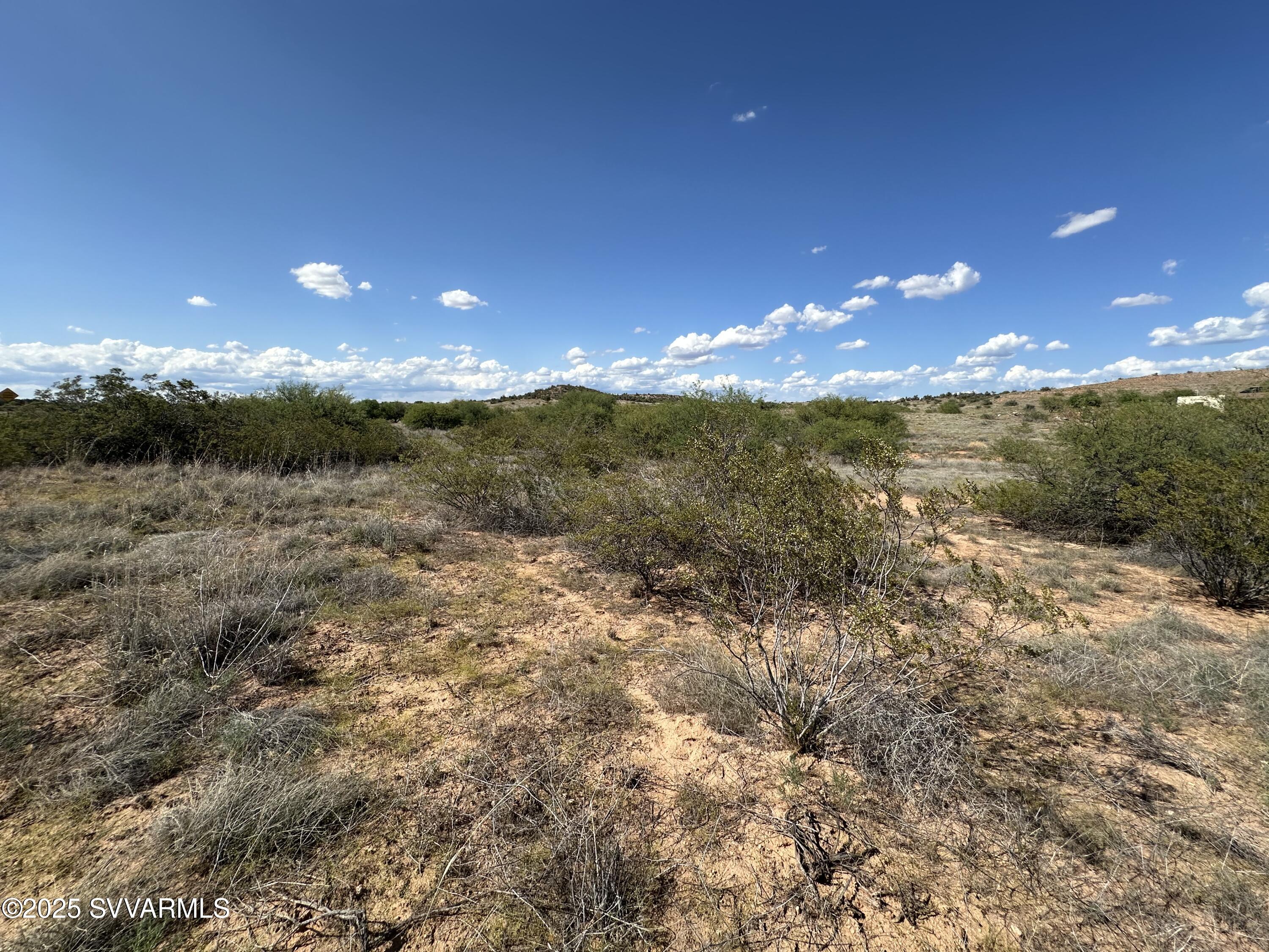 2075 South Tissaw Road Cornville, AZ 86325 - Photo 14 of 15 a view of a lake from a yard