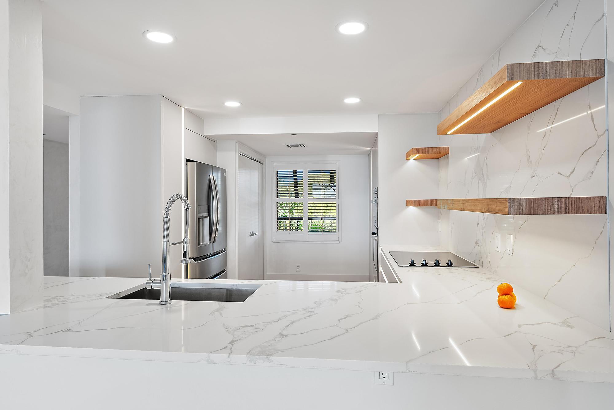 356 Golfview Road, Unit 405 North Palm Beach, FL 33408 - Photo 3 of 30 Kitchen View/Open Shutters