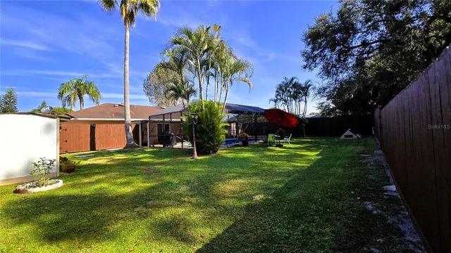 a view of a swimming pool with a patio