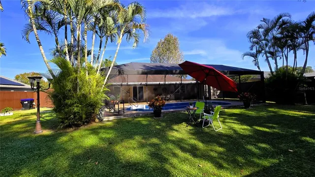 a room with lots of wooden table and chairs