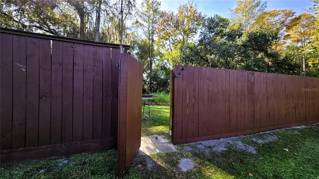 a view of swimming pool with a patio