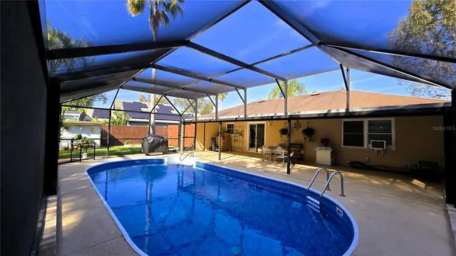 a kitchen with stainless steel appliances granite countertop a stove and a sink