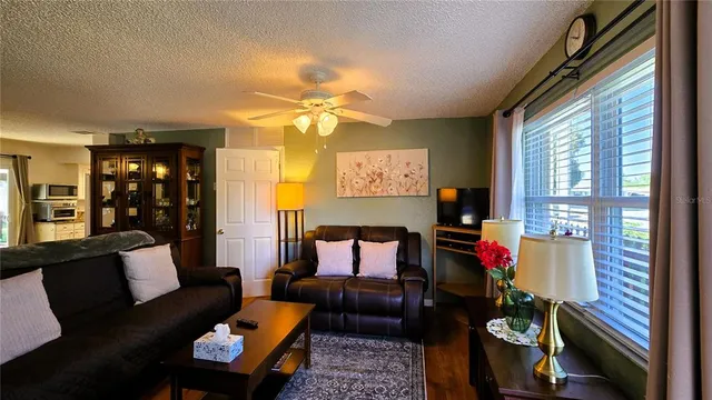 a bathroom with a sink a mirror and a shower