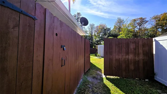 a backyard of a house with lots of green space