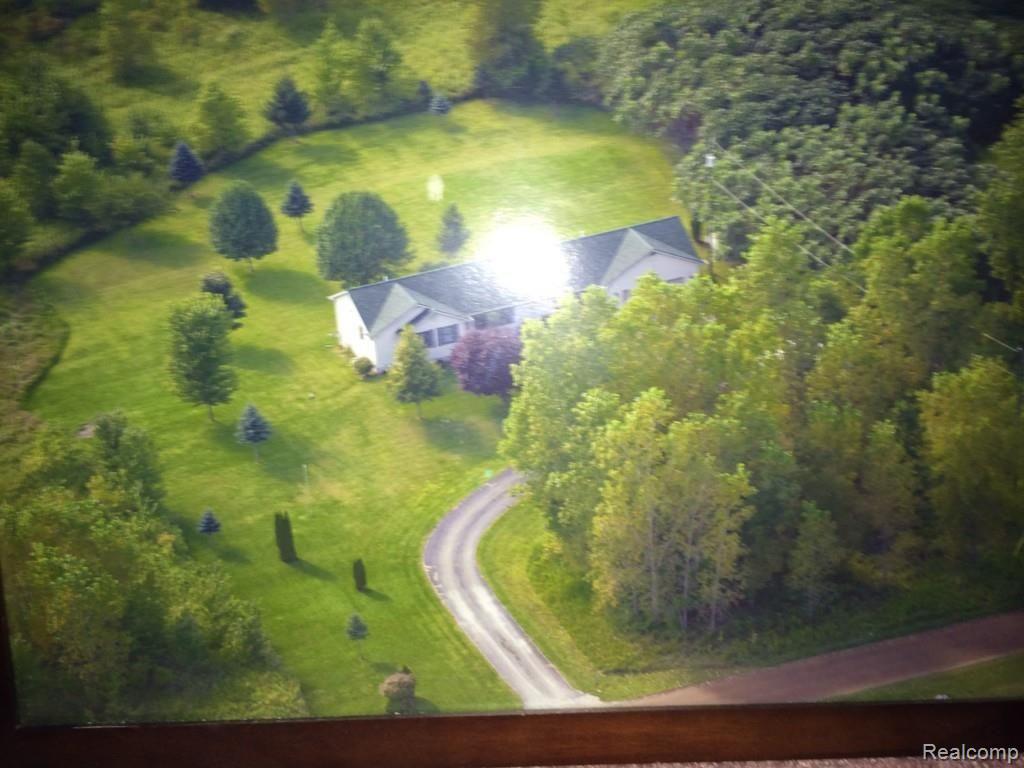 9281 North Gregory Road Fowlerville, MI 48836 - Photo 17 of 17 Summer aerial view of home and yard.