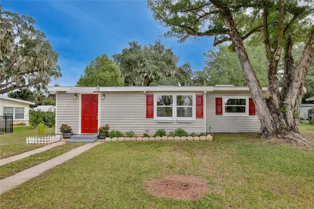 front view of a house with a yard