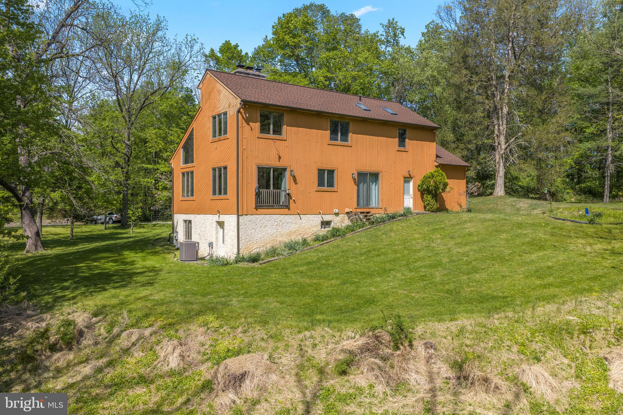 1680 East Street Road Kennett Square, PA 19348 - Photo 25 of 30 a front view of house with yard and green space