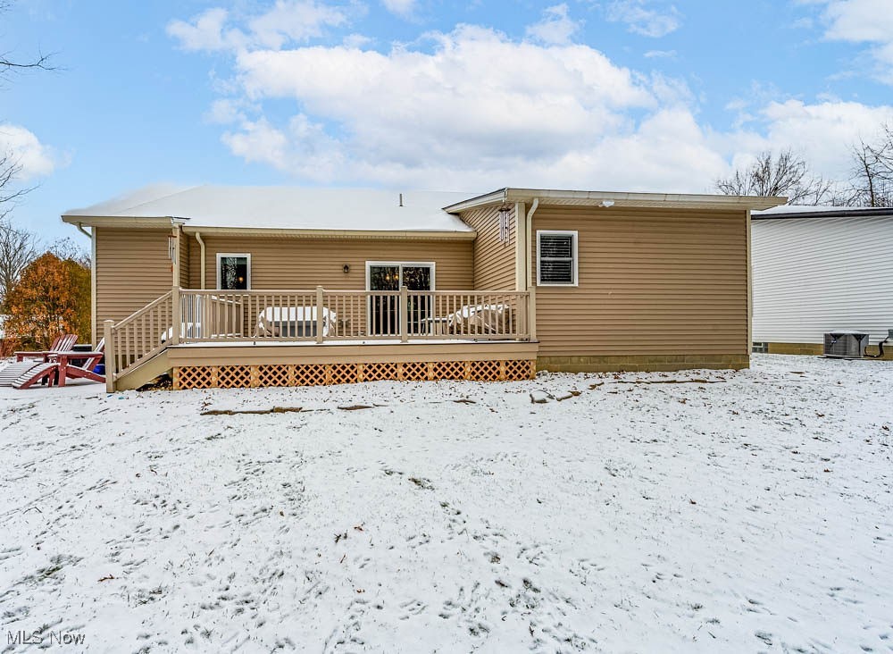 6580 Abbey Road North Canfield, OH 44406 - Photo 30 of 32 Snow covered house with a deck