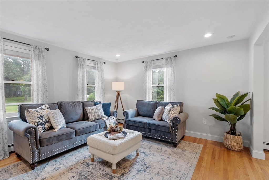 106 Reed Farm Road Boxborough, MA 01719 - Photo 11 of 40 a living room with furniture potted plant and window