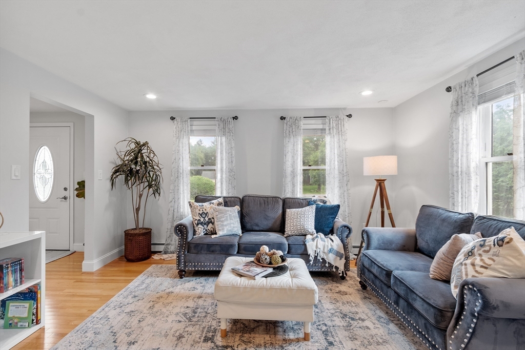 106 Reed Farm Road Boxborough, MA 01719 - Photo 12 of 40 a living room with furniture and a window