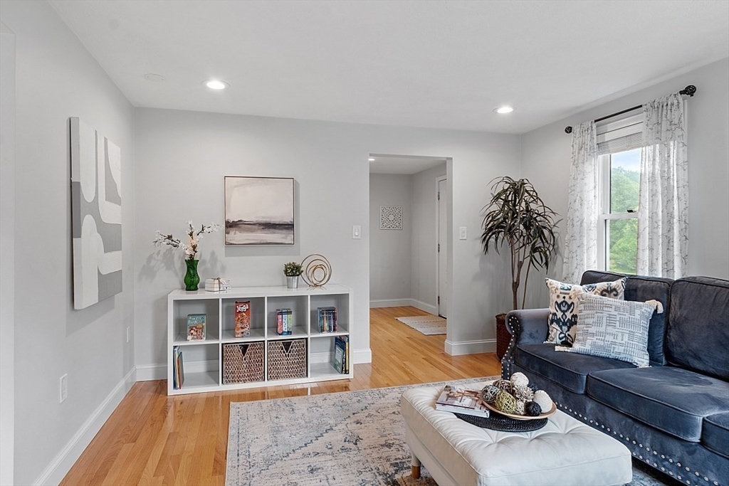 106 Reed Farm Road Boxborough, MA 01719 - Photo 13 of 40 a living room with furniture window and wooden floor