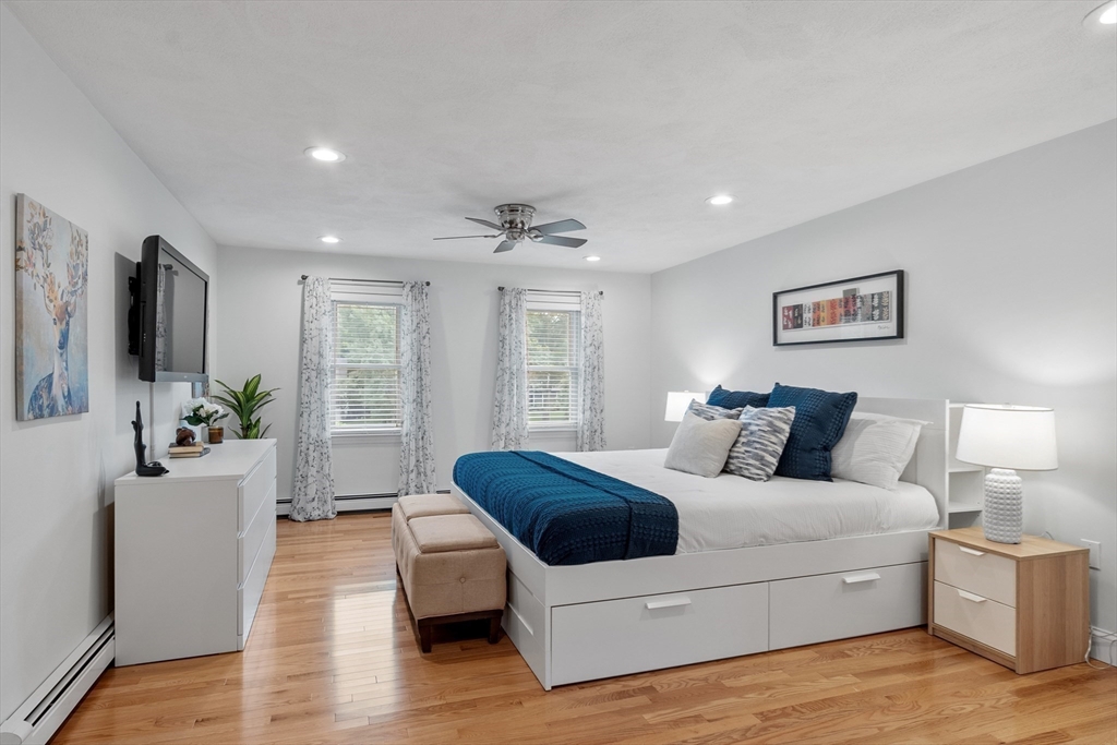 106 Reed Farm Road Boxborough, MA 01719 - Photo 16 of 40 a living room with furniture and a large window