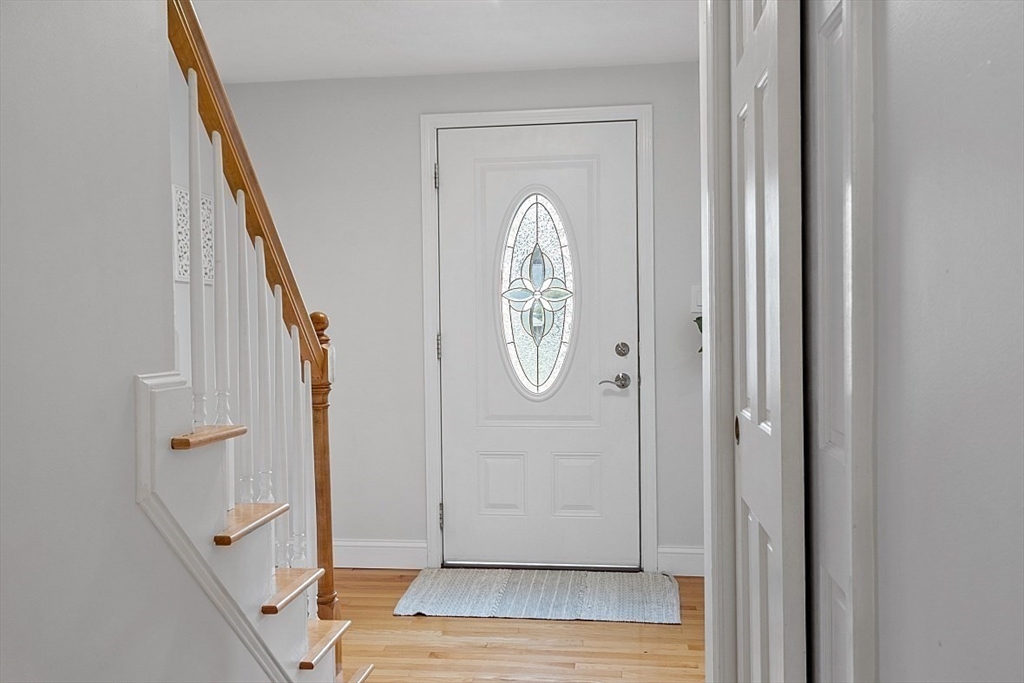 106 Reed Farm Road Boxborough, MA 01719 - Photo 2 of 40 a view of entryway with wooden floor