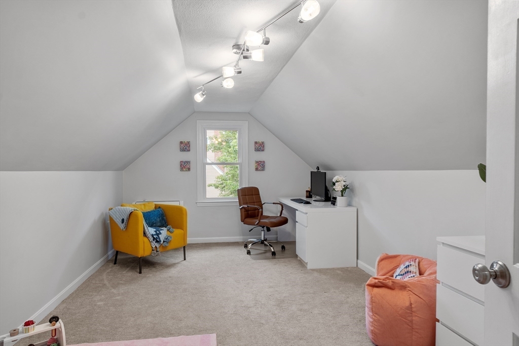 106 Reed Farm Road Boxborough, MA 01719 - Photo 22 of 40 a view of a room with gym equipment