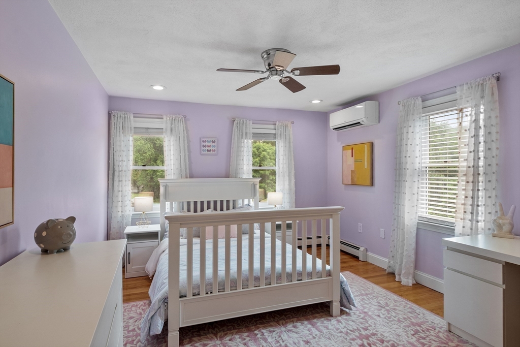 106 Reed Farm Road Boxborough, MA 01719 - Photo 26 of 40 a bedroom with furniture and windows