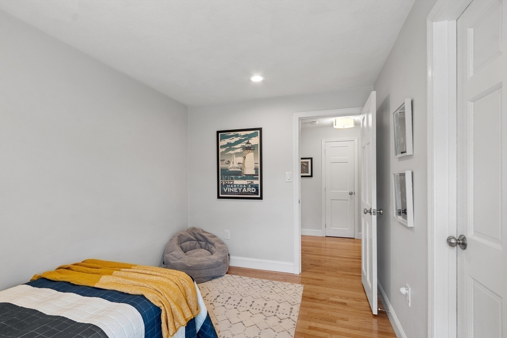 106 Reed Farm Road Boxborough, MA 01719 - Photo 29 of 40 a bedroom with a bed and a view of bathroom
