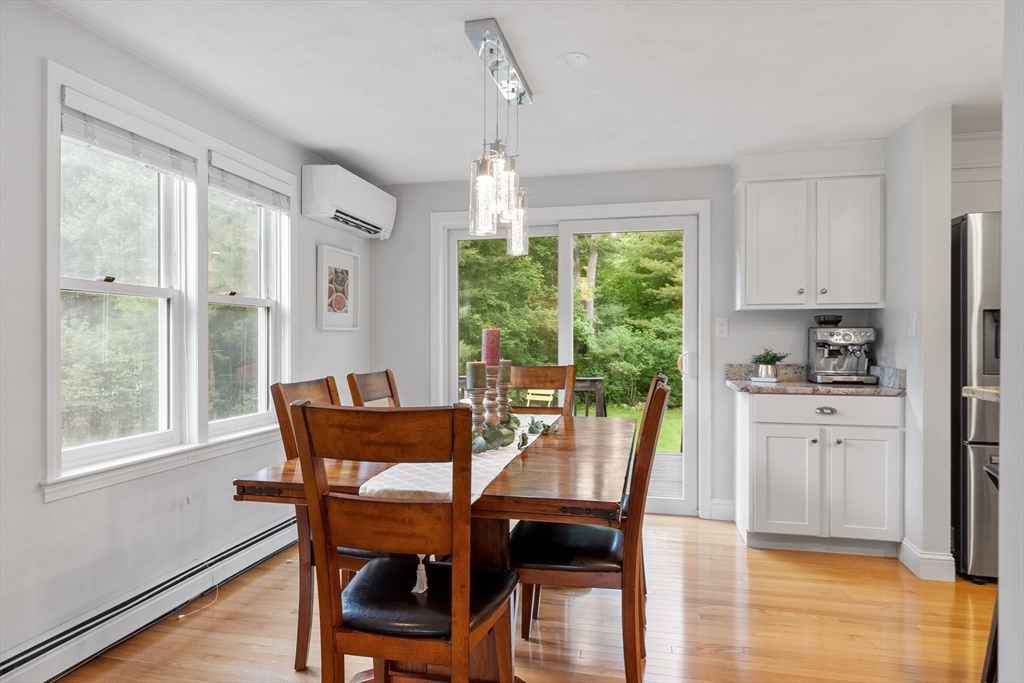 106 Reed Farm Road Boxborough, MA 01719 - Photo 7 of 40 a dining room with furniture and window