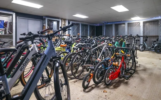 a view of a brick building with many windows