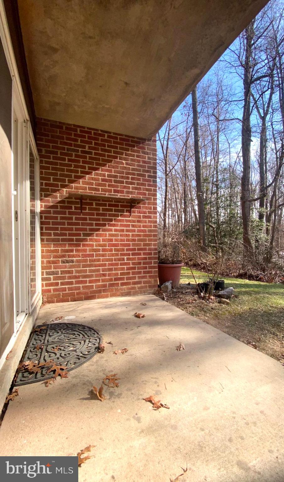 11839 Shire Court, Unit 2C Reston, VA 20191 - Photo 15 of 60 a view of a brick house with a street