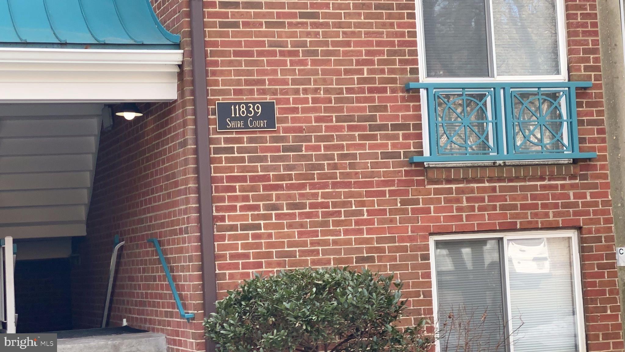 11839 Shire Court, Unit 2C Reston, VA 20191 - Photo 2 of 60 a brick building with a window