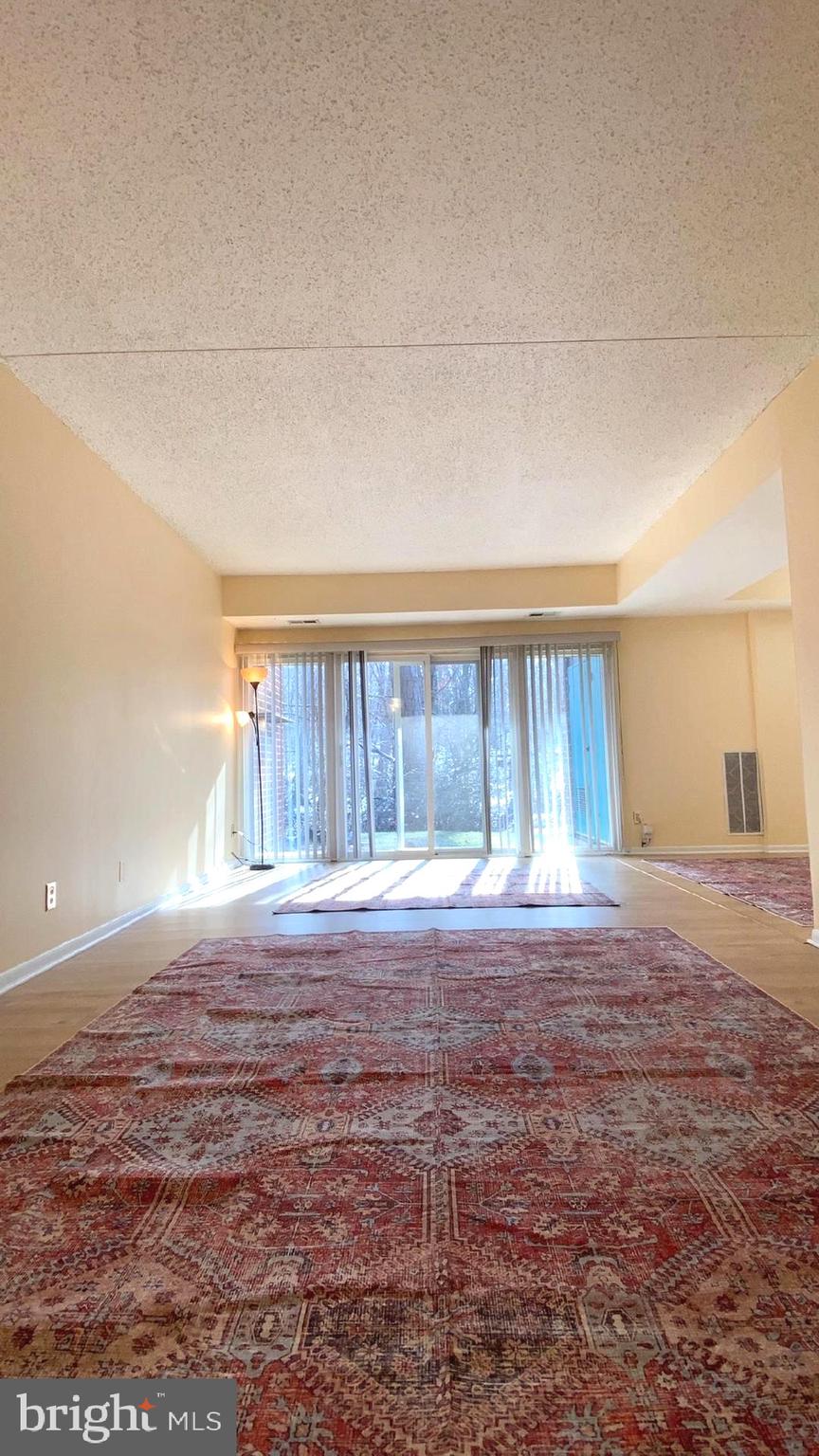 11839 Shire Court, Unit 2C Reston, VA 20191 - Photo 53 of 60 a view of a livingroom with a window and storage