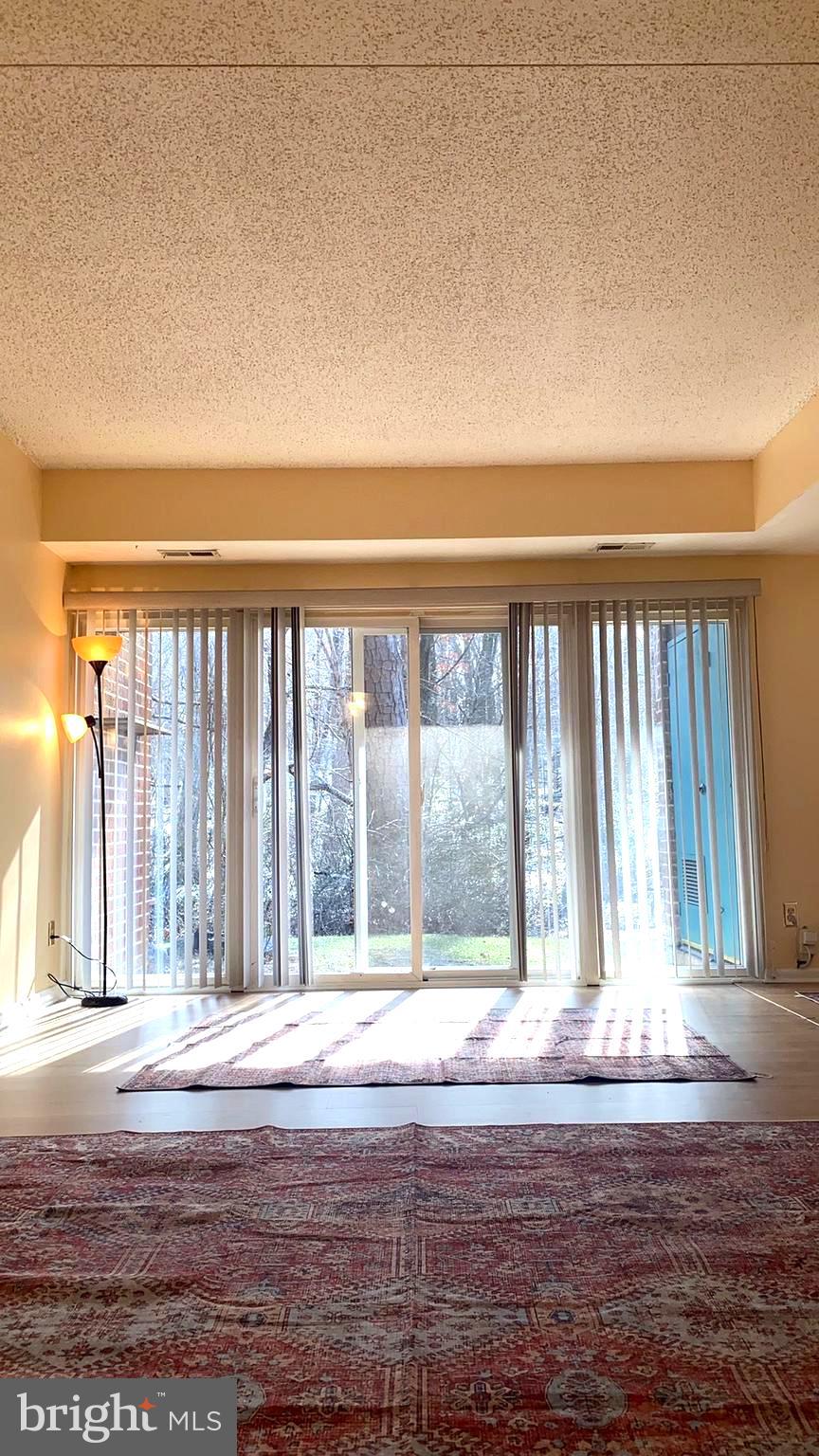 11839 Shire Court, Unit 2C Reston, VA 20191 - Photo 8 of 60 a view of swimming pool from window