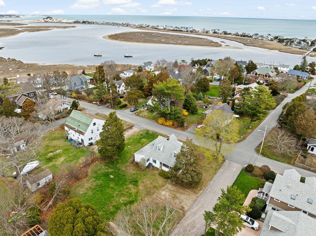 12 Ferry Hill Road Marshfield, MA 02050 - Photo 1 of 14 an aerial view of ocean and residential houses with outdoor space