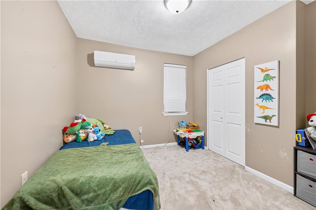 1 6th Avenue Freedom, PA 15042 - Photo 14 of 20 a bedroom with a bed and wooden floor
