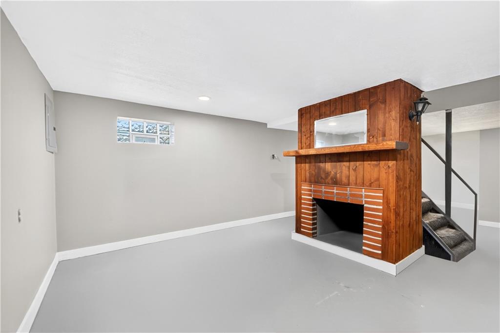 1 6th Avenue Freedom, PA 15042 - Photo 16 of 20 a living room with furniture and a fireplace