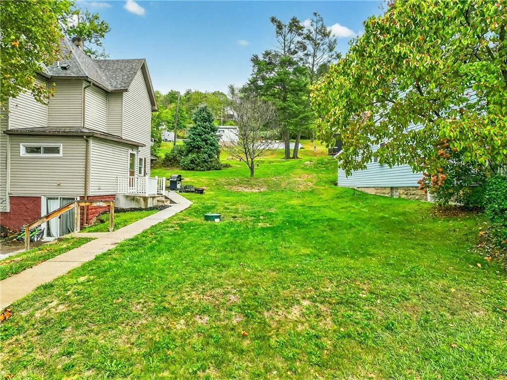 1 6th Avenue Freedom, PA 15042 - Photo 19 of 20 a view of a house with backyard and a tree