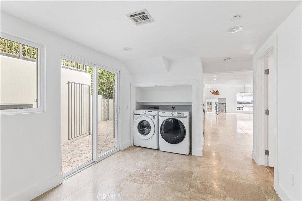 362 Pinecrest Drive Laguna Beach, CA 92651 - Photo 20 of 32 a view of a hallway with washer and dryer