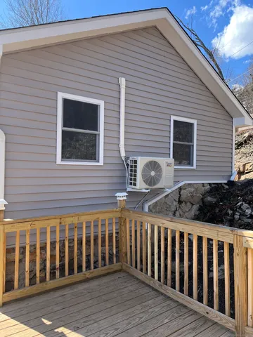 a view of a backyard of the house