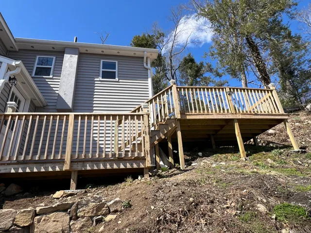 a house view with a backyard