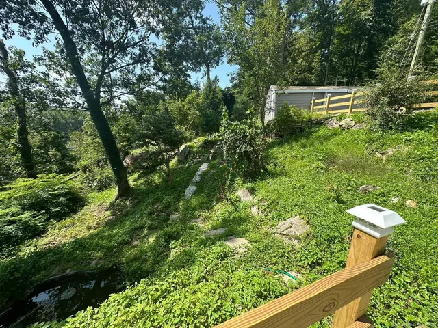 a view of a garden from a balcony