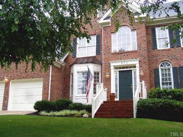 613 Sarah Lawrence Court Raleigh, NC 27609 - Photo 1 of 1 a front view of a house with garden