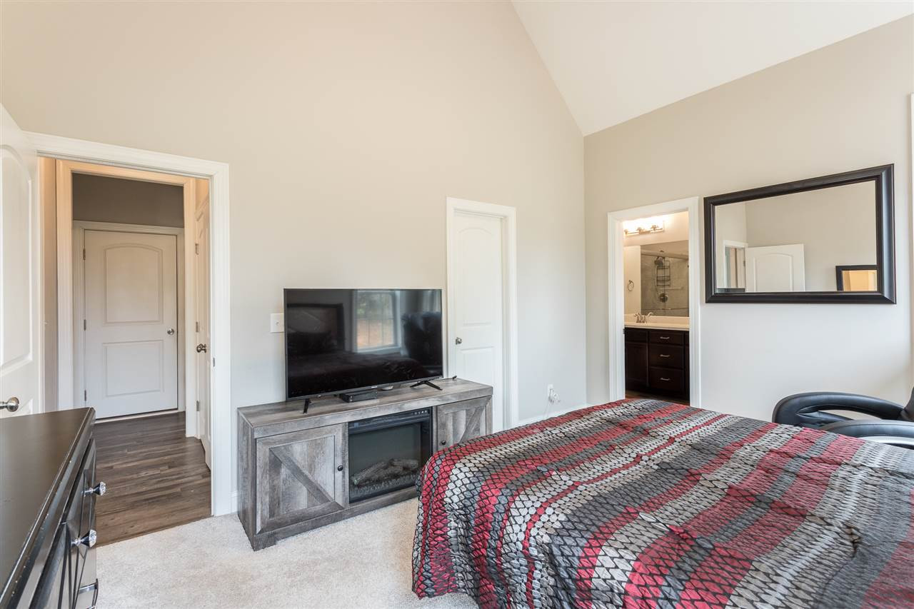 3318 High Gate Road Raleigh, NC 27603 - Photo 6 of 16 Cathedral ceilings in the first floor master! Master Bedroom