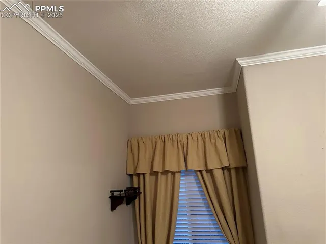 a view of balcony with wooden floor