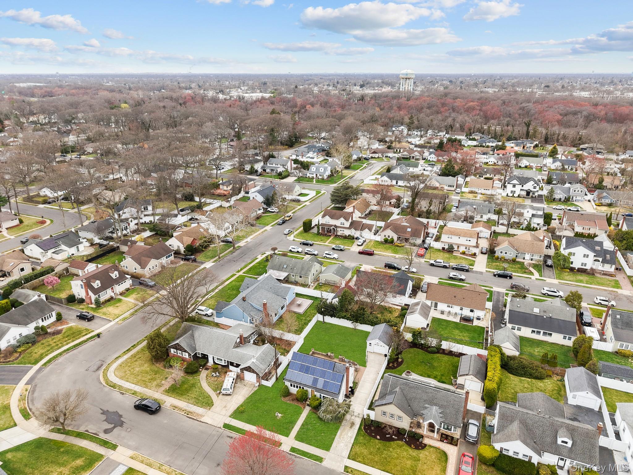 762 Buchanan Road East Meadow, NY 11554 - Photo 16 of 40 an aerial view of residential building with parking