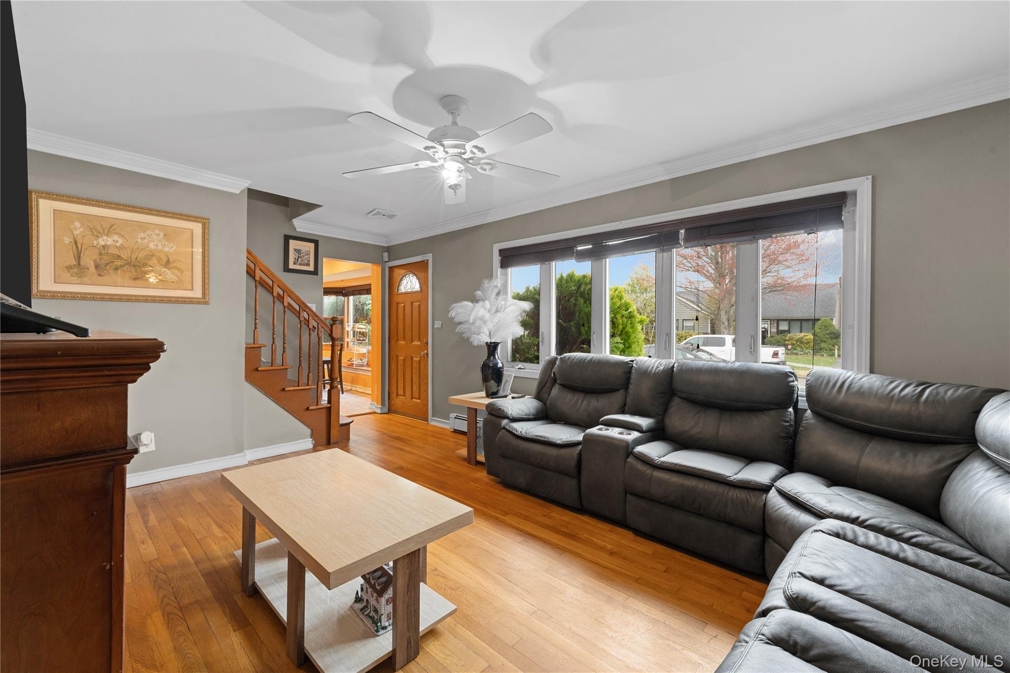 762 Buchanan Road East Meadow, NY 11554 - Photo 17 of 40 a living room with furniture and a large window