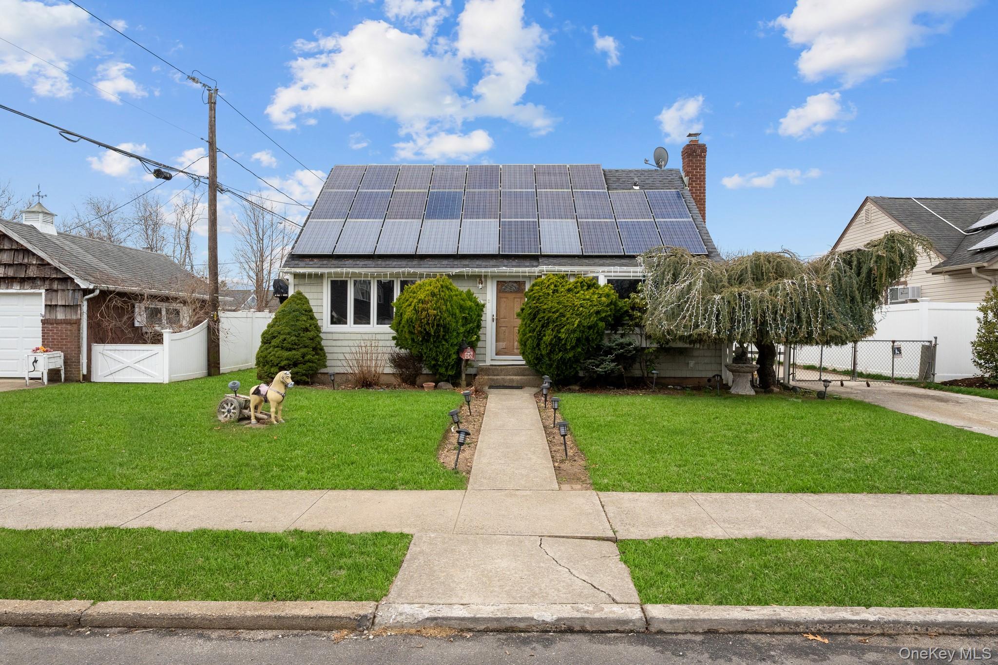 762 Buchanan Road East Meadow, NY 11554 - Photo 2 of 40 a house view with a garden space