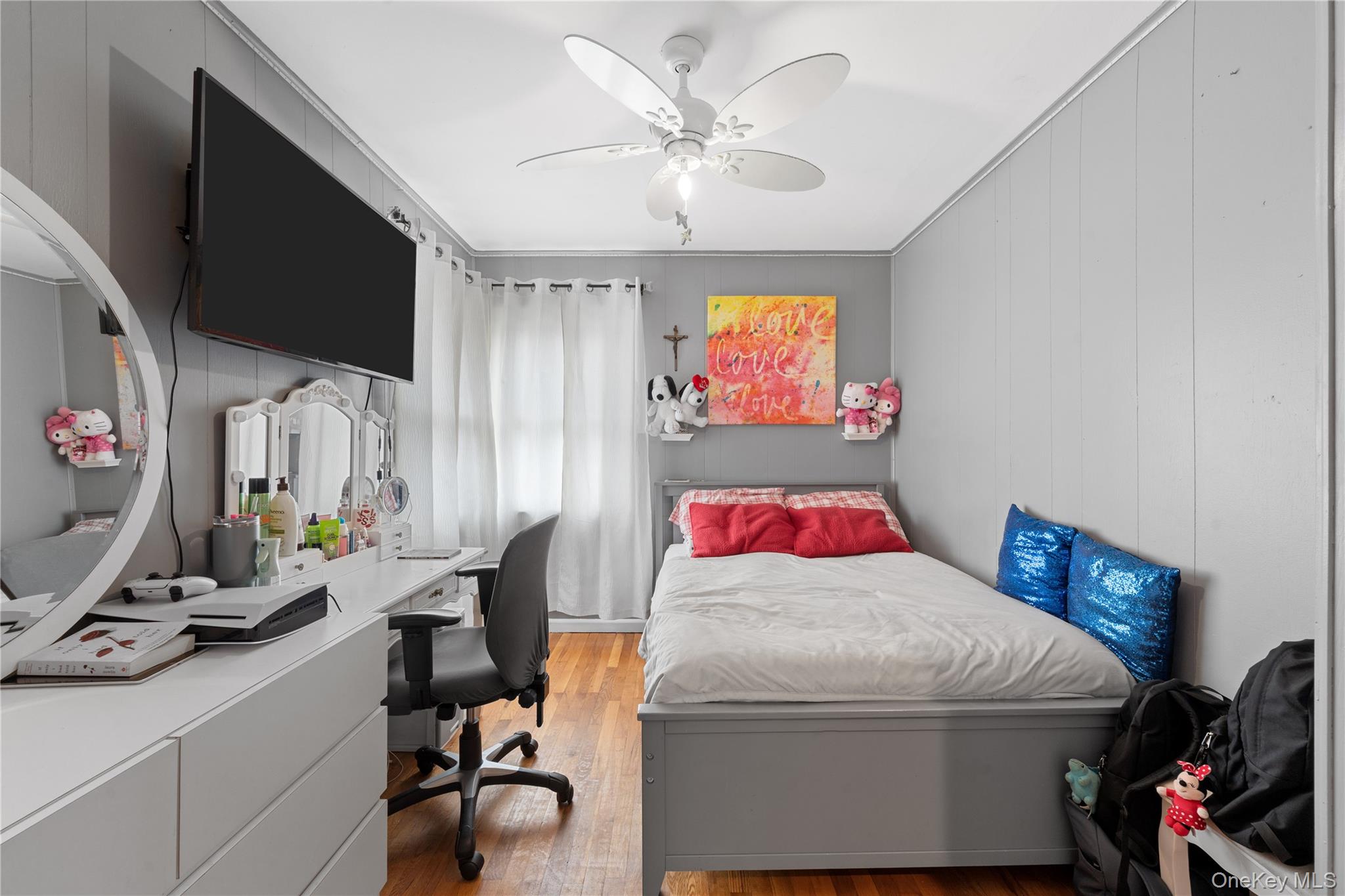 762 Buchanan Road East Meadow, NY 11554 - Photo 30 of 40 a bedroom with a bed and a flat screen tv