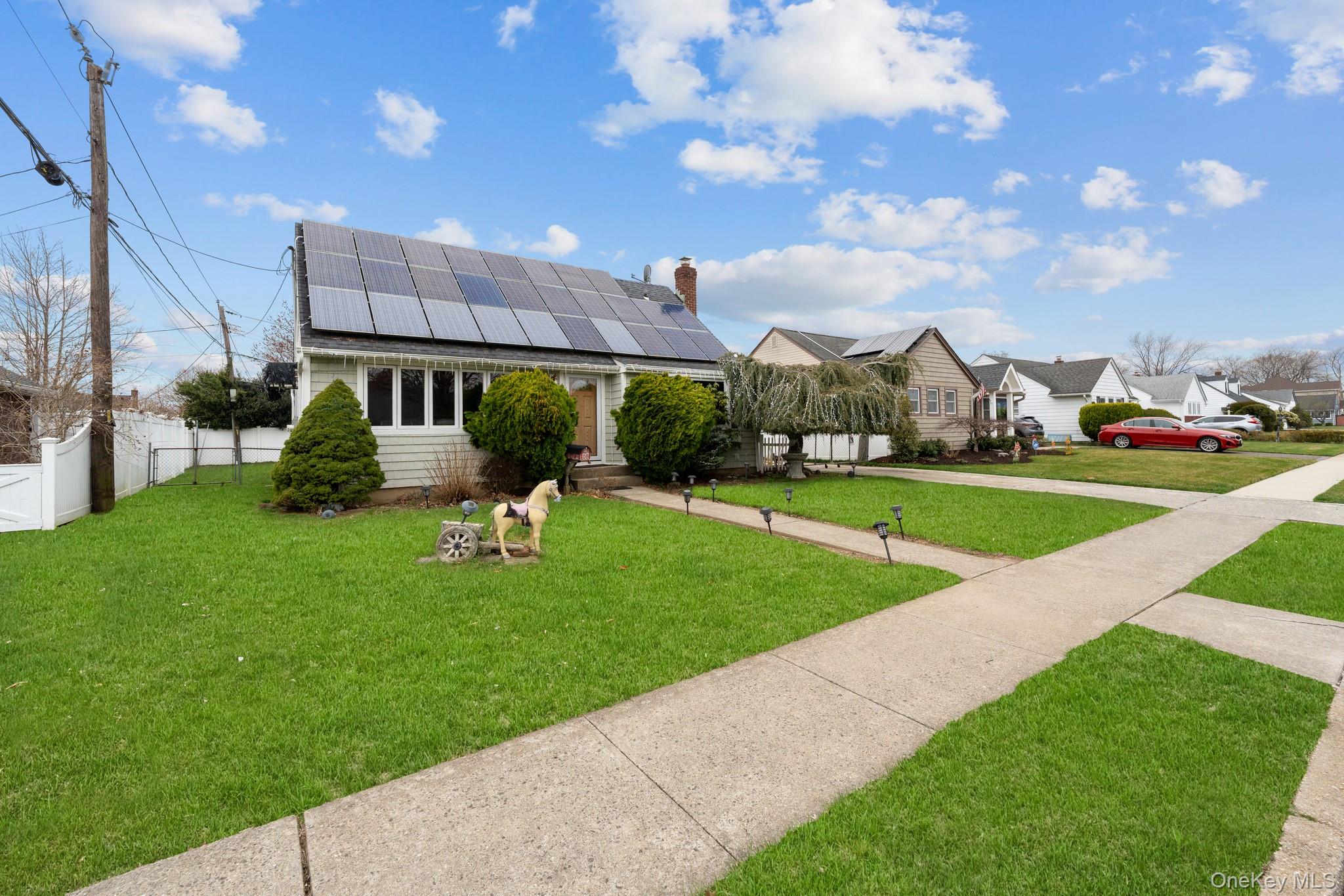 762 Buchanan Road East Meadow, NY 11554 - Photo 3 of 40 a view of a garden with houses