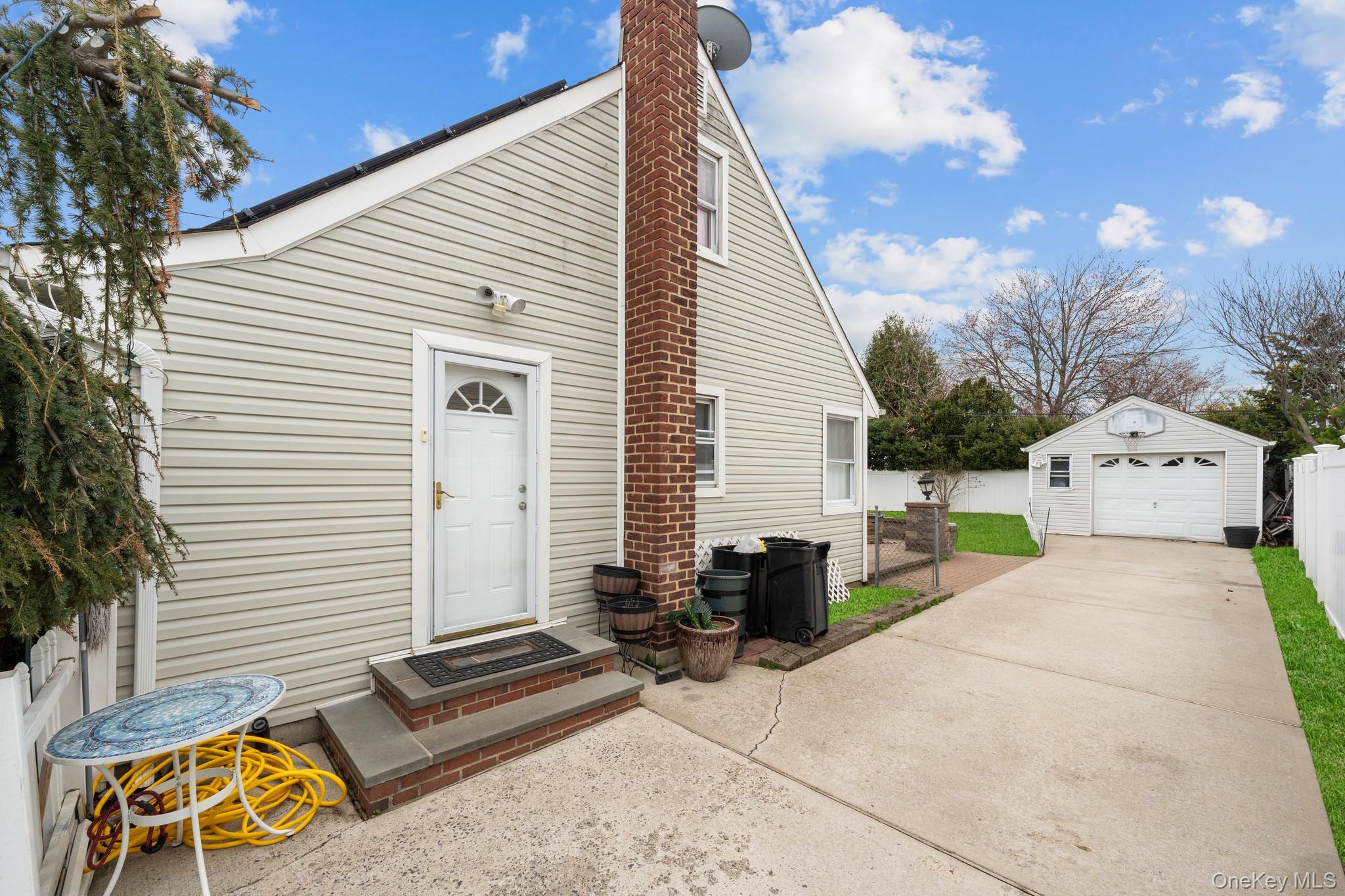 762 Buchanan Road East Meadow, NY 11554 - Photo 5 of 40 a view of backyard with sitting area