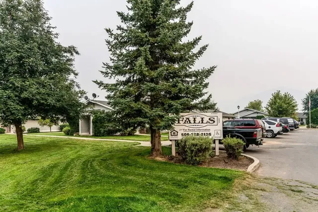 a building with trees in front of it
