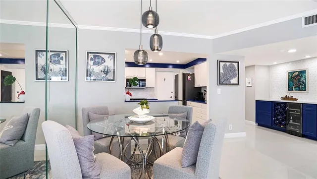 a view of a bedroom with a bed and a window