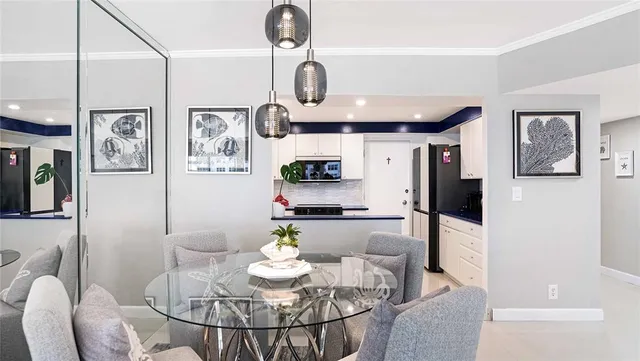 a kitchen with stainless steel appliances granite countertop a sink and cabinets