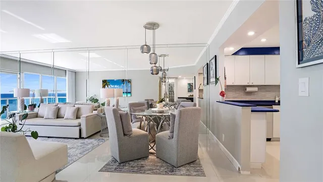 a kitchen with stainless steel appliances granite countertop a sink and a stove