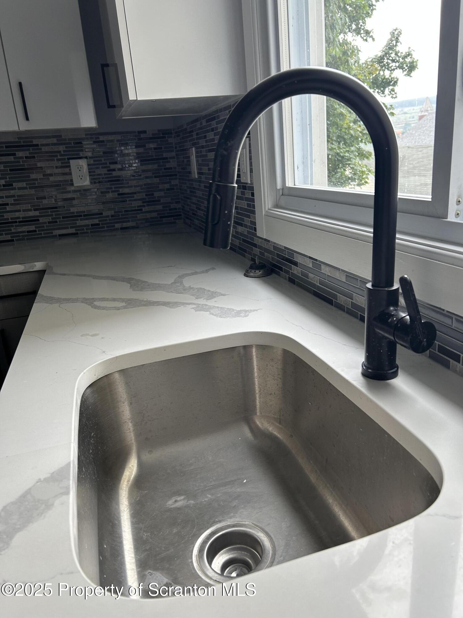 99 Washington Street Carbondale, PA 18407 - Photo 4 of 20 a close view of sink